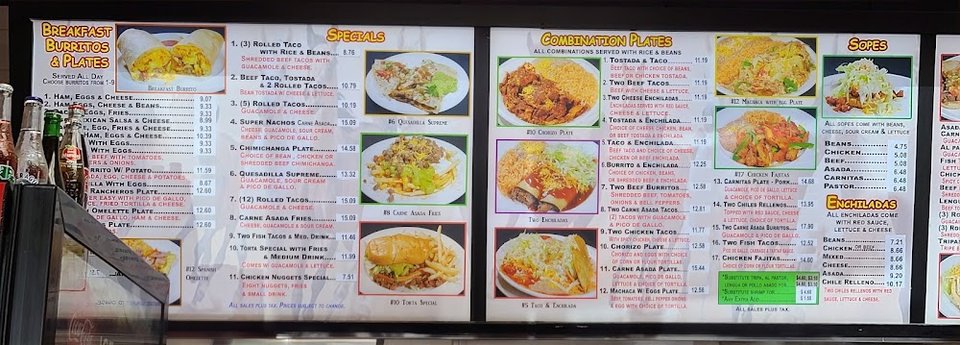 Menu board with breakfast burritos and plates.